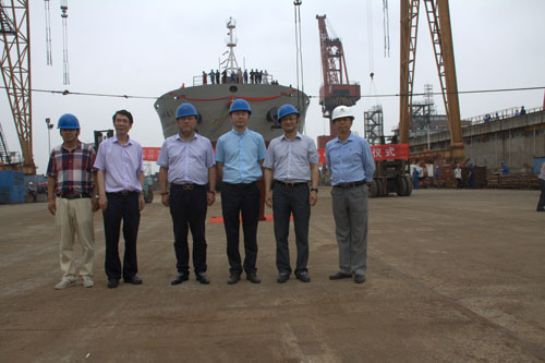 593f9e2d0f81e.jpg 领导合照小.jpg